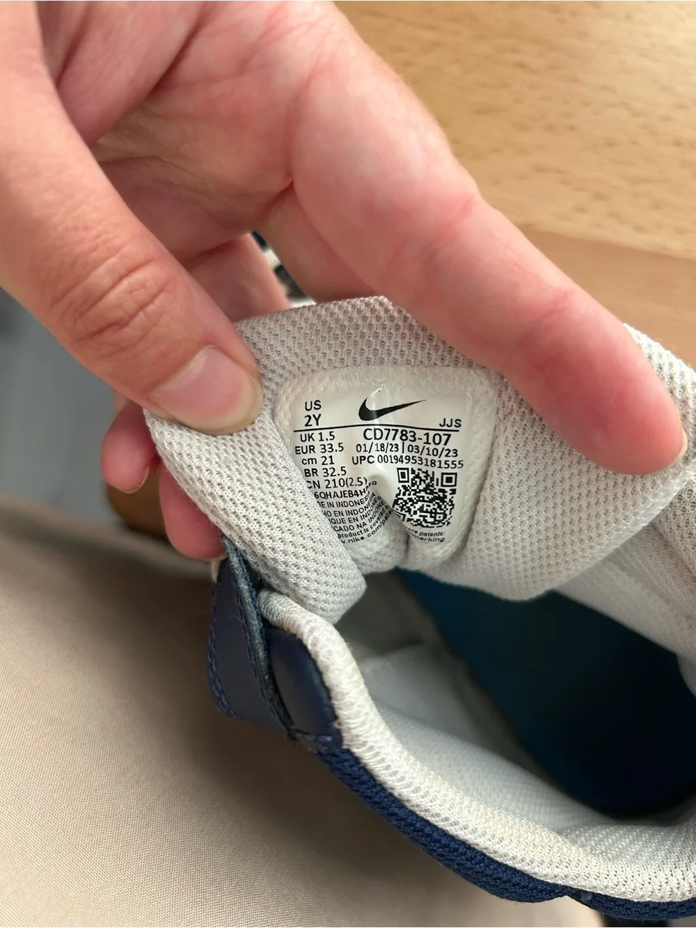 Nike Kids High-Top Sneakers in White and Navy